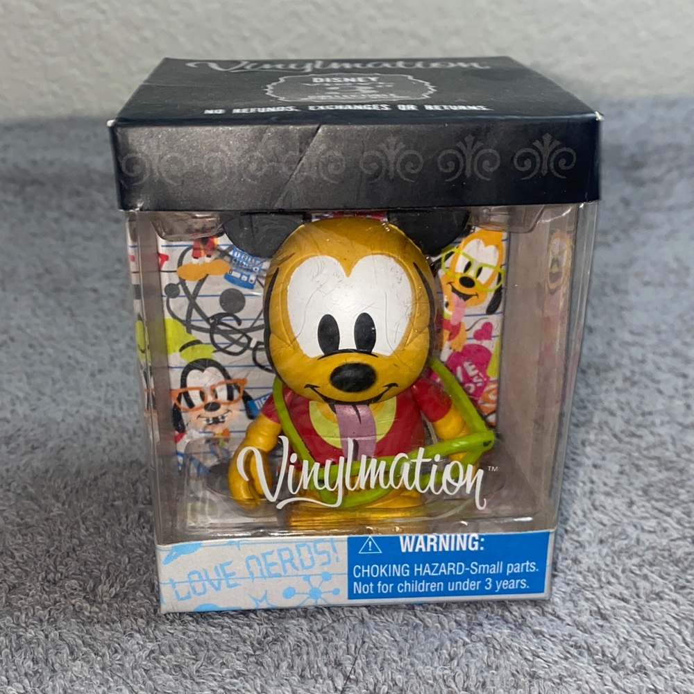 NWT Retired Disney Vinylmation Pluto from the "Nerds" series!